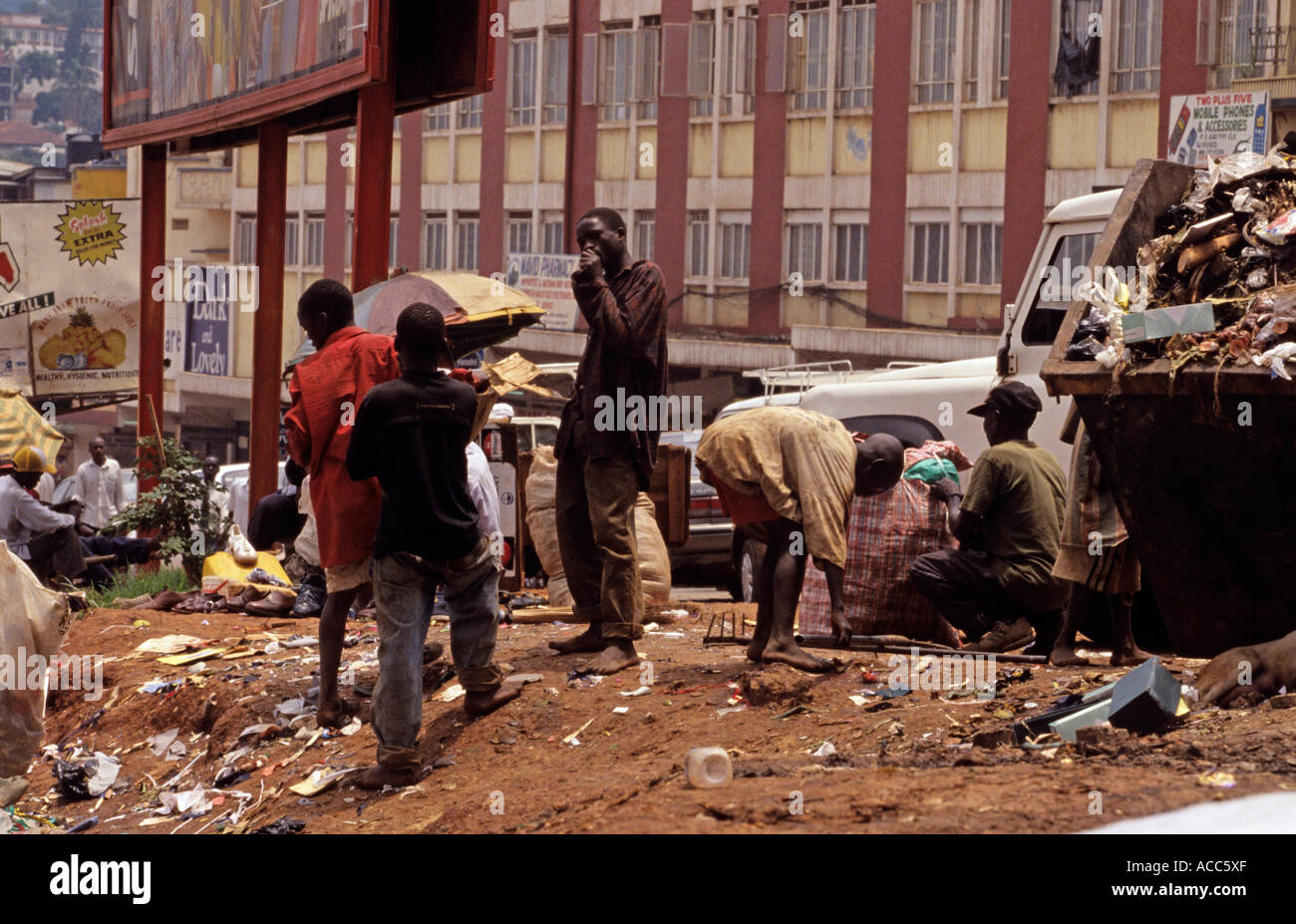 Glue sniffers and scavengers on street, Uganda Stock Photo