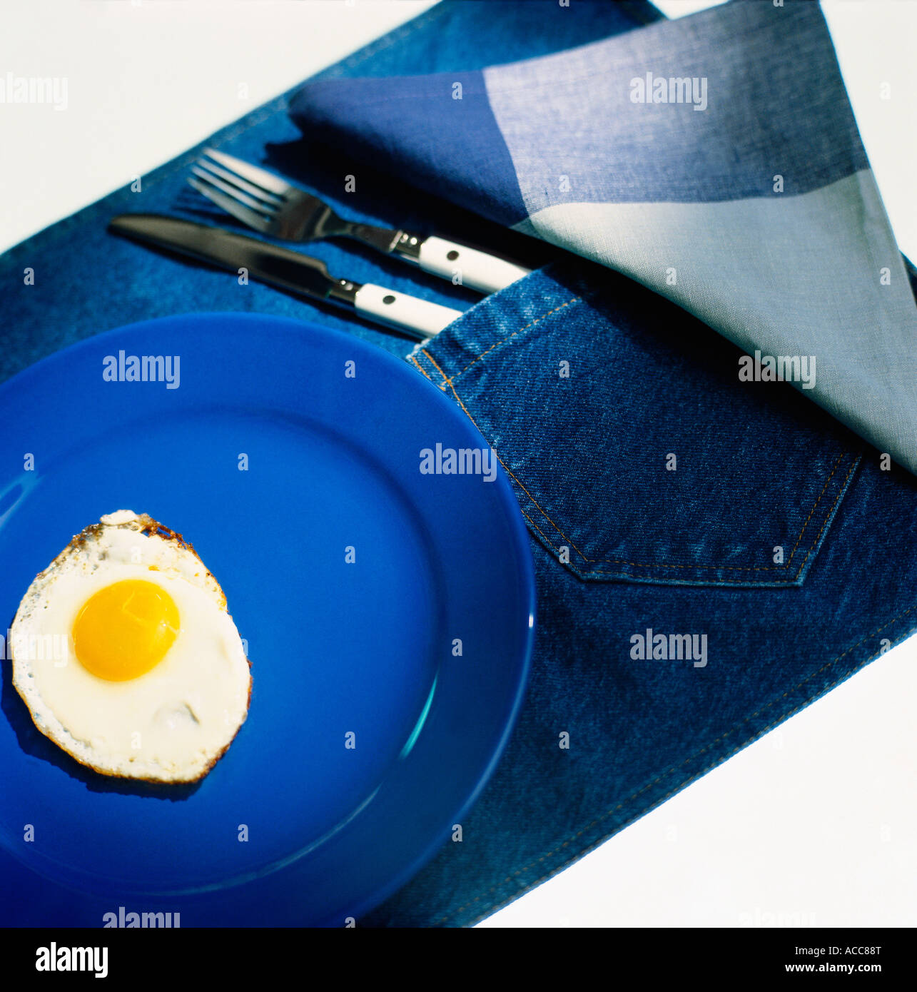 A fried egg on a plate. Stock Photo