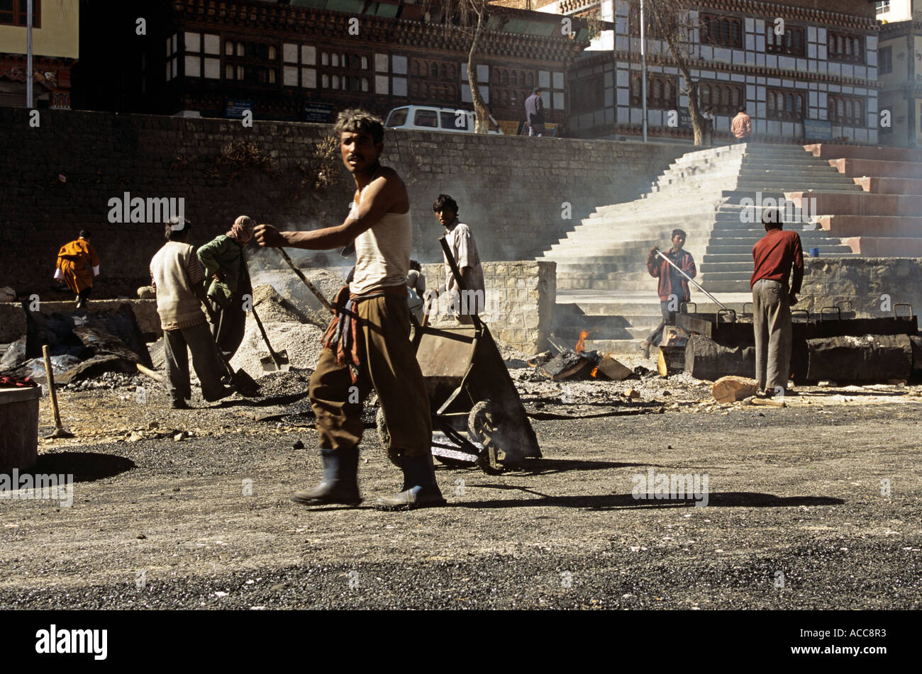 Road builders in Thimphu Bhutan Stock Photo