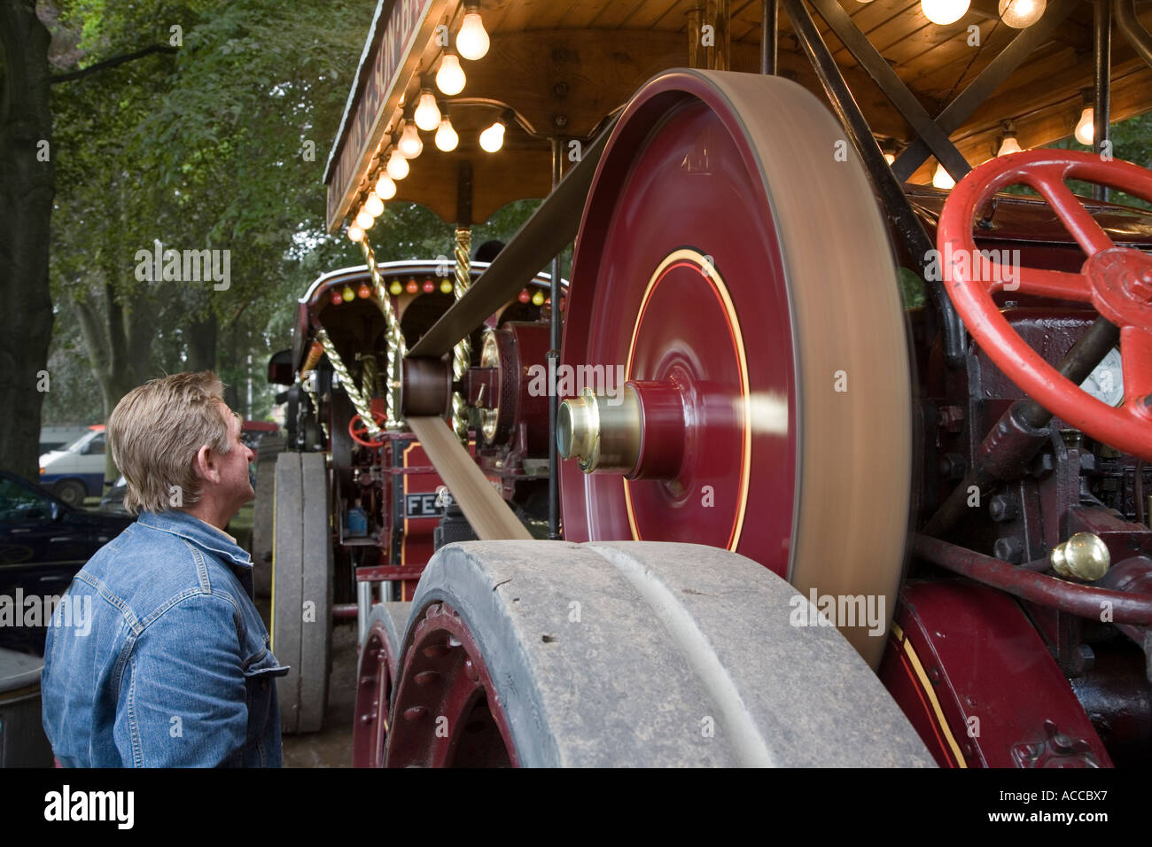 Spinning flywheel on traction engine Abergavenny Wales UK Stock Photo