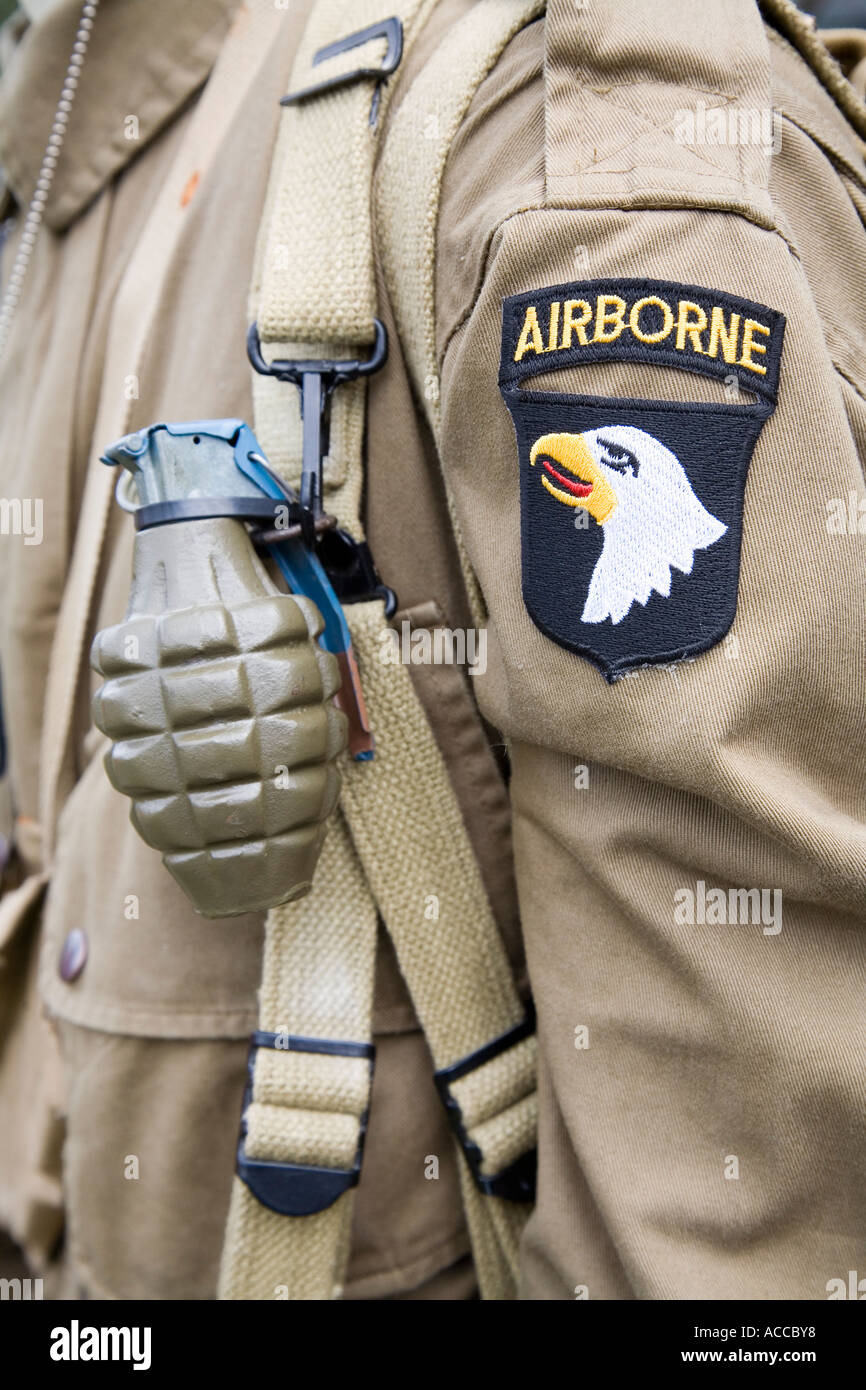 World War 2 US airborne troops military badge on arm of uniform with replica grenade Stock Photo