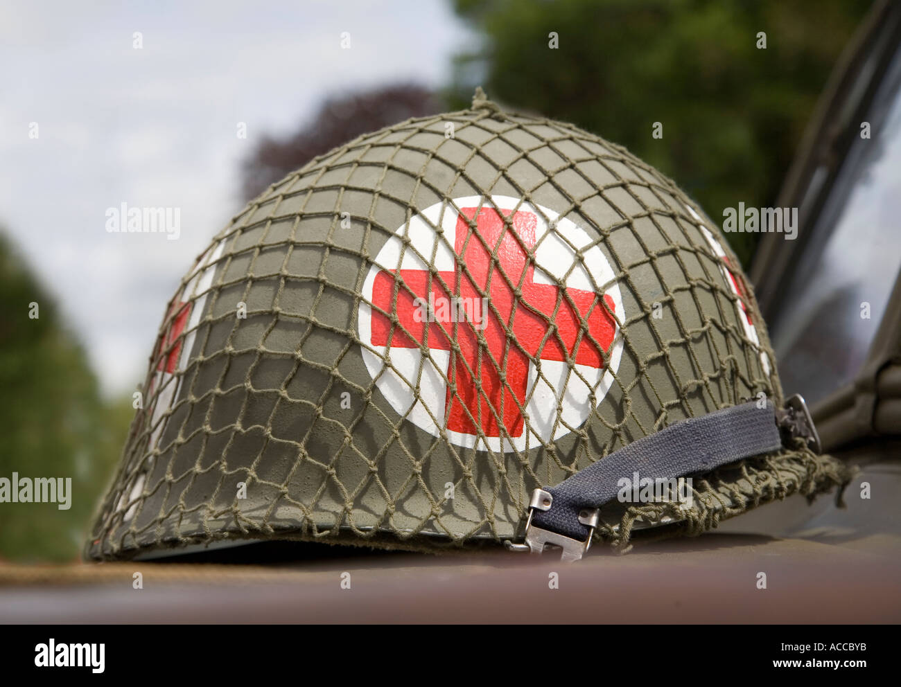 American Second World War US military medical red cross helmet on the hood  of a jeep at a display UK Stock Photo - Alamy