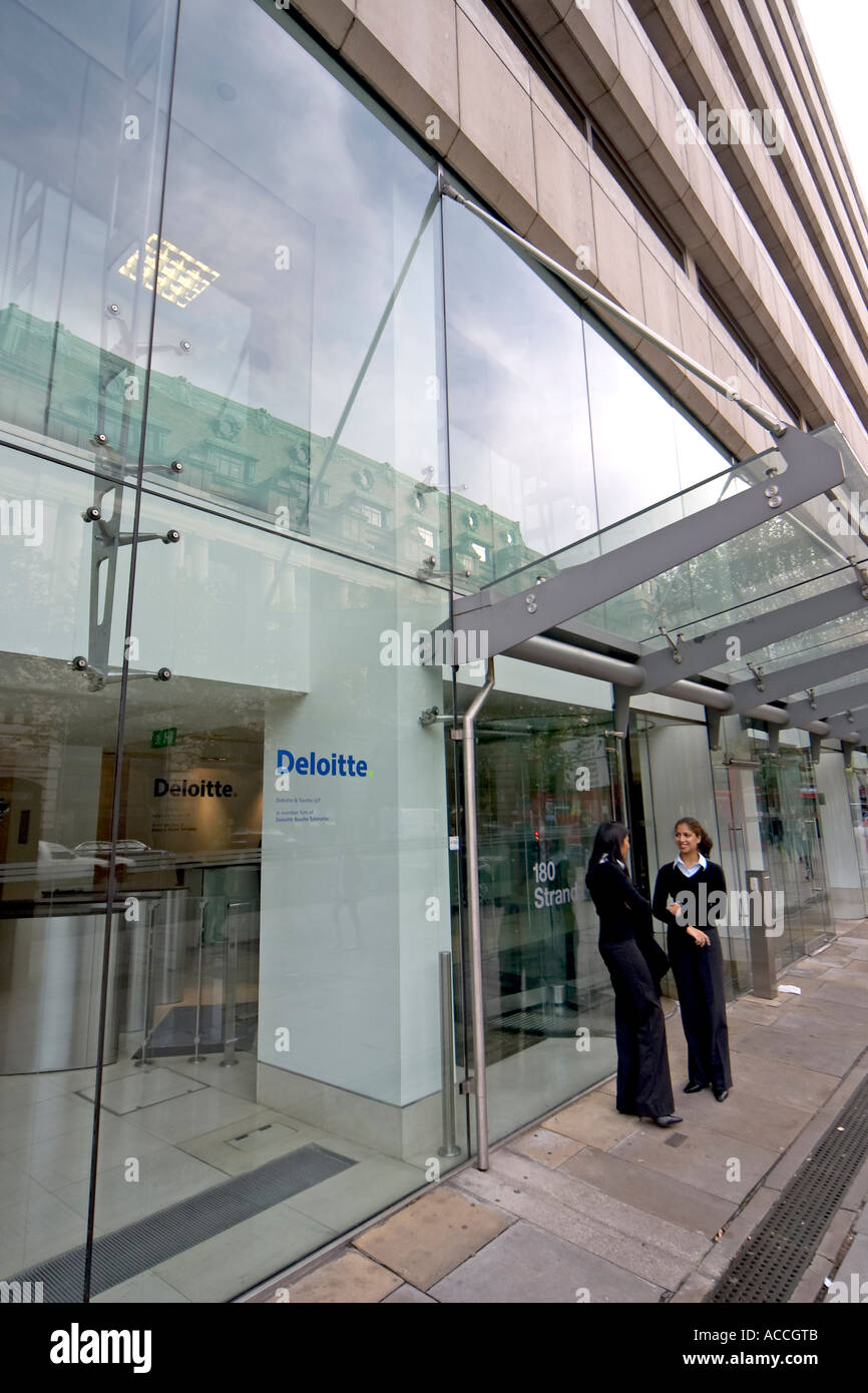 Offices of Deloitte accountants with people outside and logo on the
