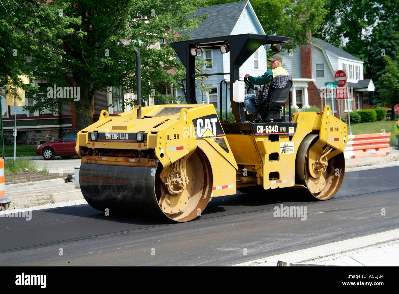 Steam roller Construction crew creates new asphalt street Stock Photo 4281011 Alamy
