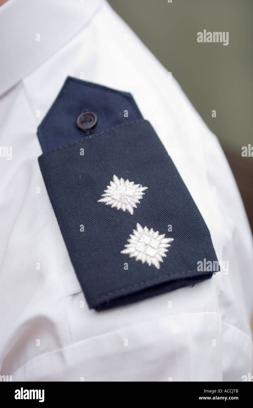 a police inspectors badge on his shirt Stock Photo