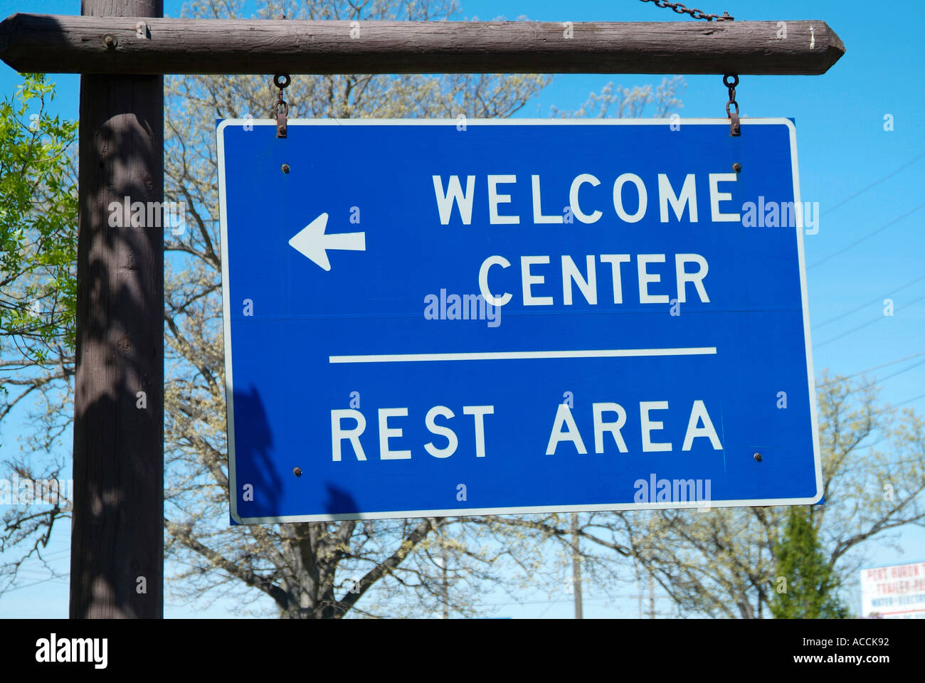 Traffic sign showing directions to center and rest area Stock