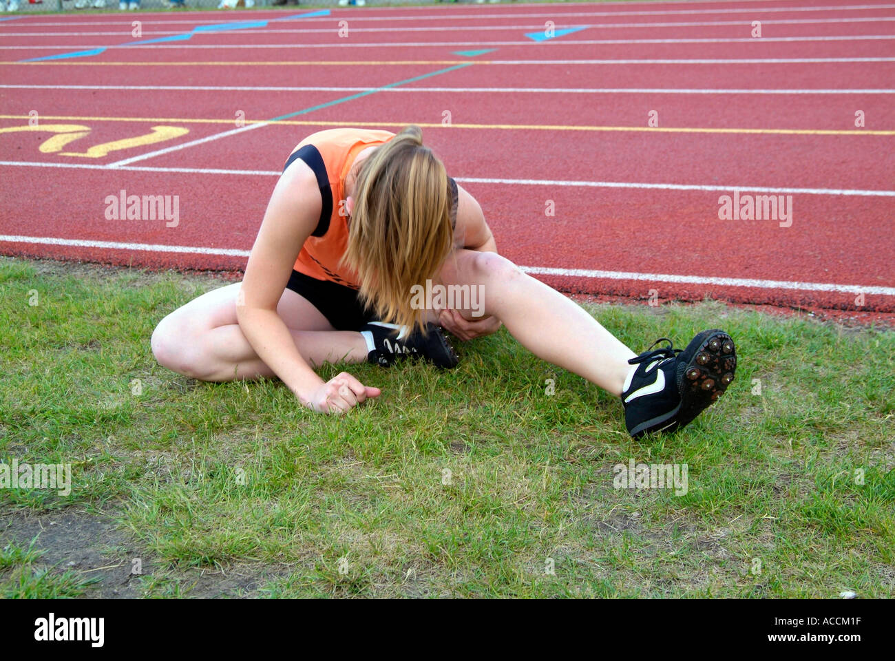 High School Track and Field Events muscle injury Stock Photo Alamy