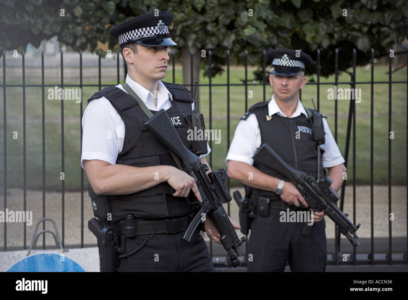 Armed British Police Officers in London England UK Stock Photo