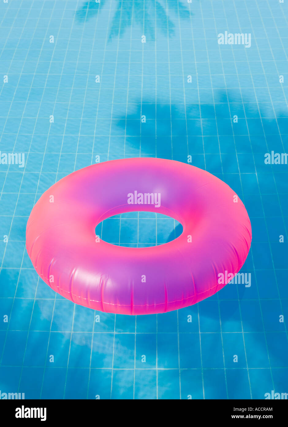 An inflatable ring in a pool Stock Photo - Alamy