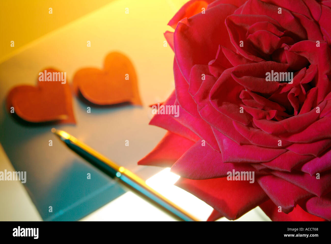 PR red rose and love message with two red hearts Stock Photo - Alamy