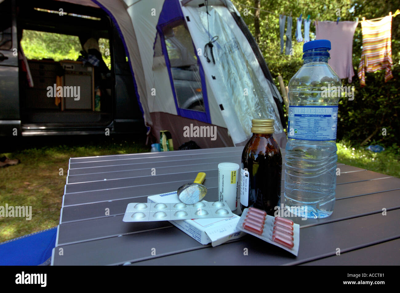 travel and sickness illness drugs medication on a camping table in