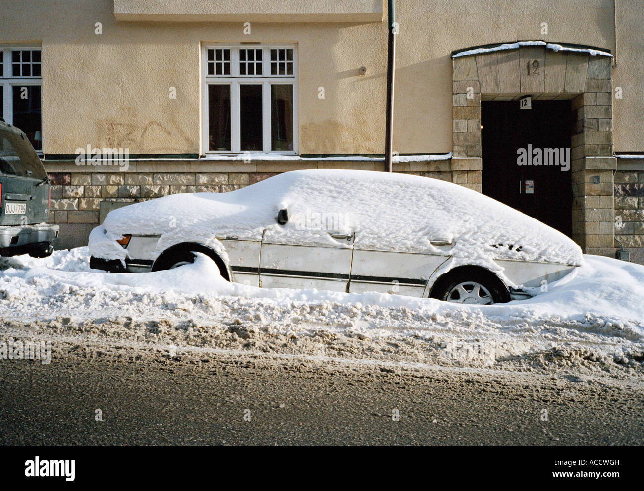 A car covered in snow Stock Photo Alamy