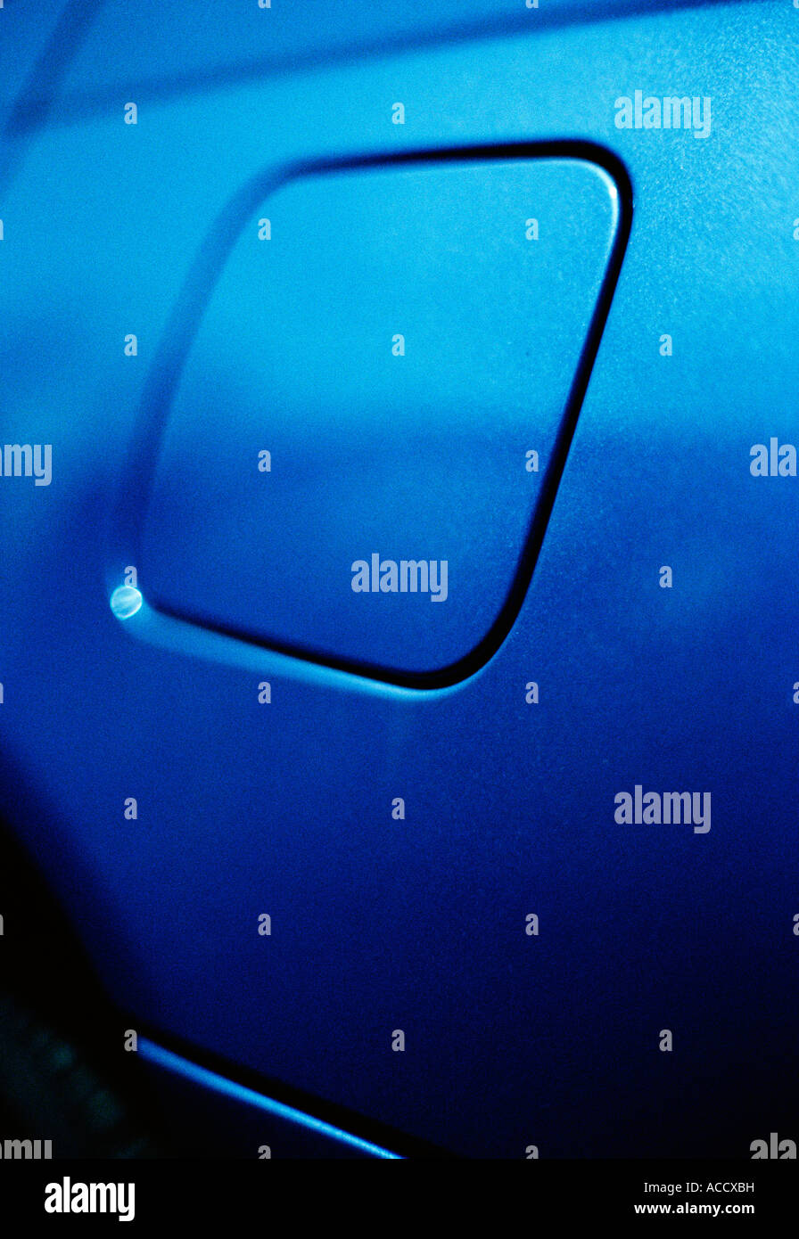 A petrol lid on a blue car. Stock Photo