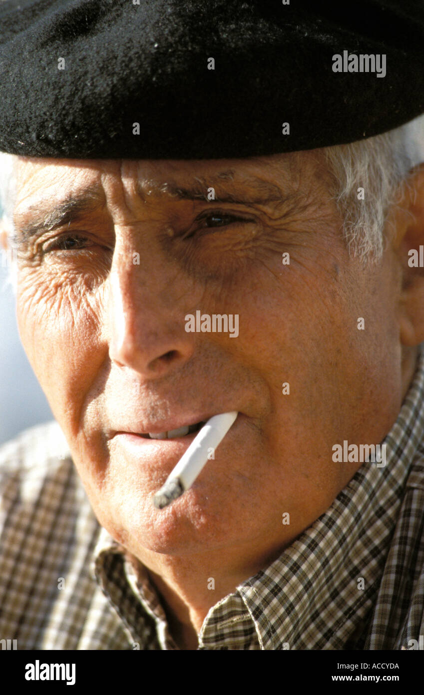fisherman smoking cigarette Stock Photo