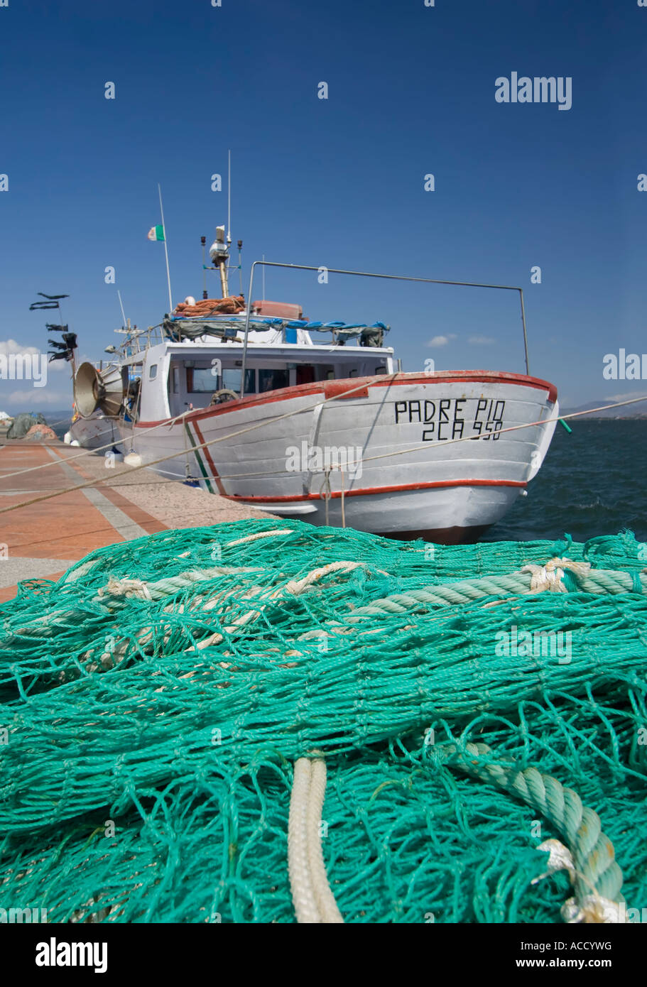 Fishing Boat and net, Sardinia, Italy Stock Photo