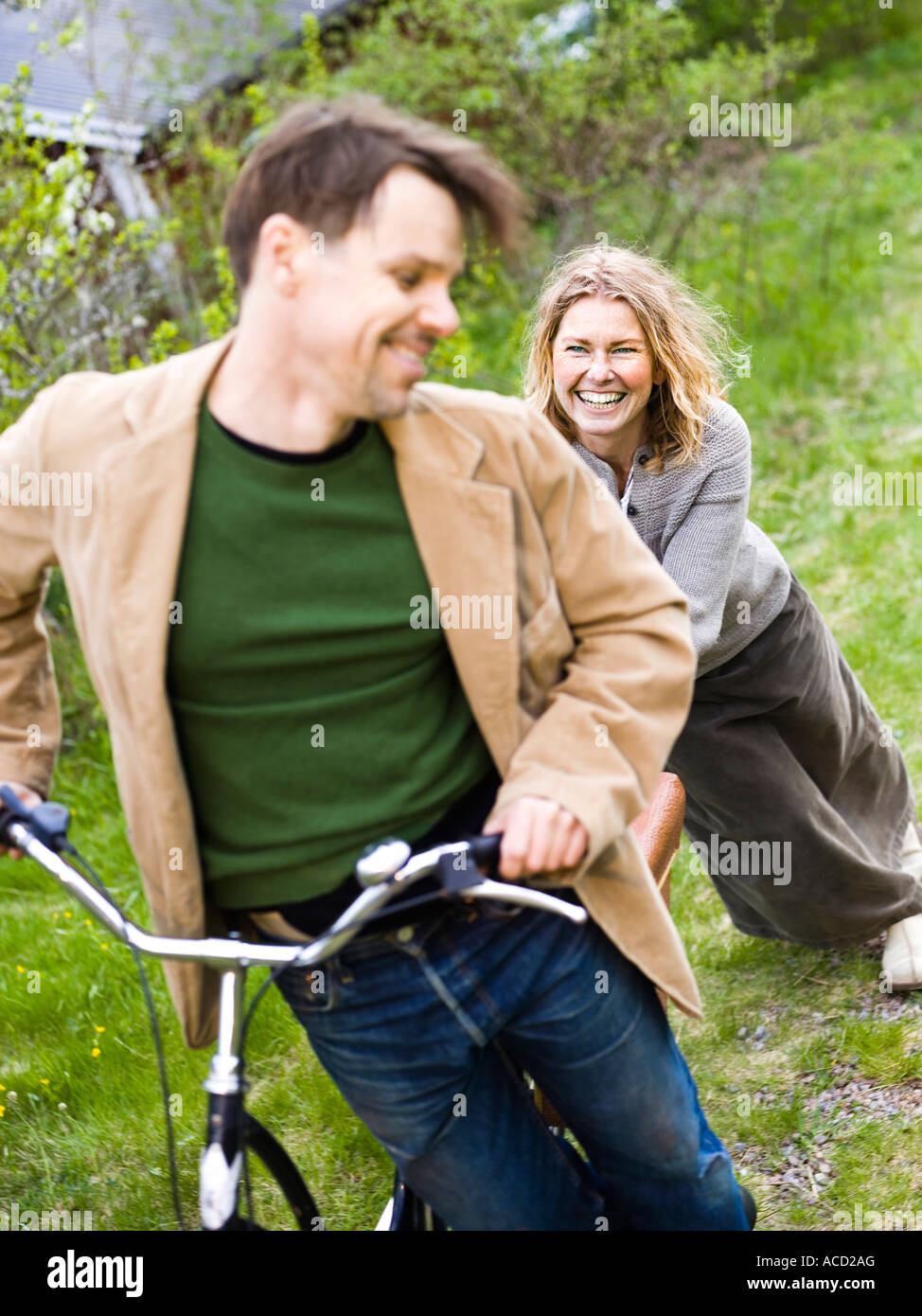 A woman and a man laughing Stock Photo - Alamy