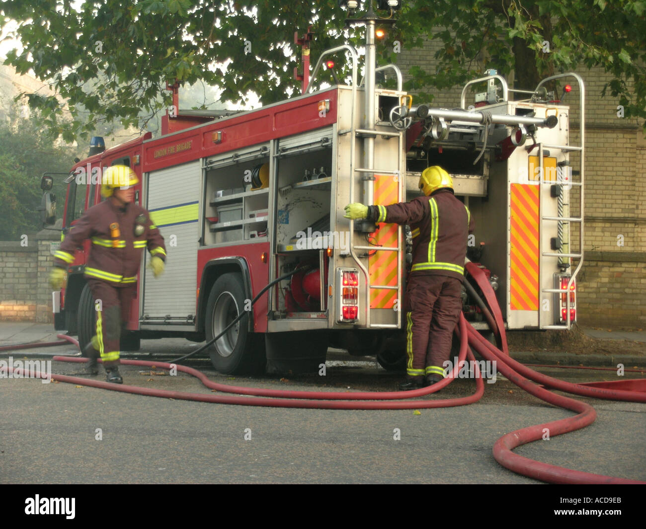 day London Fire Brigade attending a fire England Stock Photo