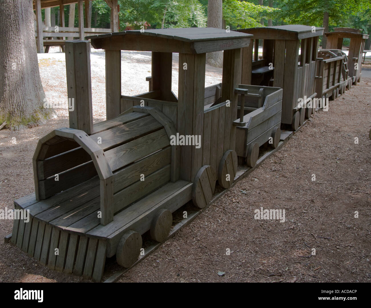 Miniature wooden train in a playground Stock Photo - Alamy