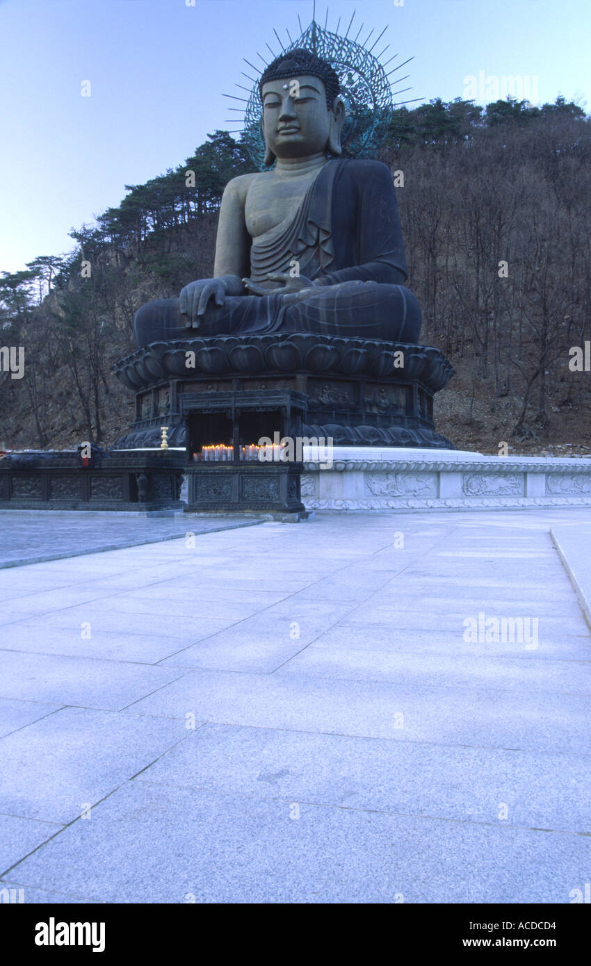 A large seated Buddha near the entrance to Mt Sorak National Park South Korea Stock Photo