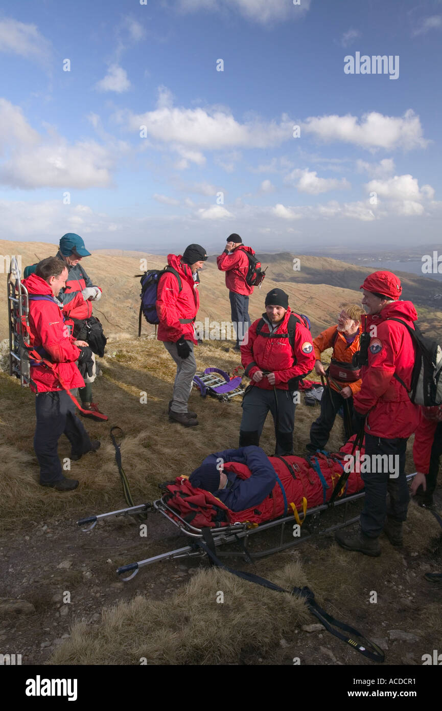 Members of the Langdale Ambleside mountain rescue Team, rescue a man