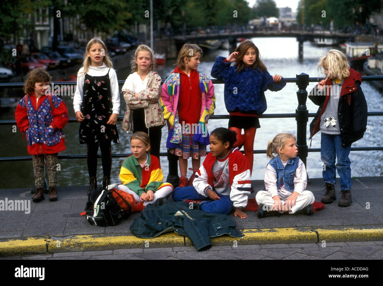 Dutch children, Dutch girls, children girls, schoolgirls, schoolchildren, singing song, singing, singers, The Singel, Amsterdam, Holland, Netherlands Stock Photo