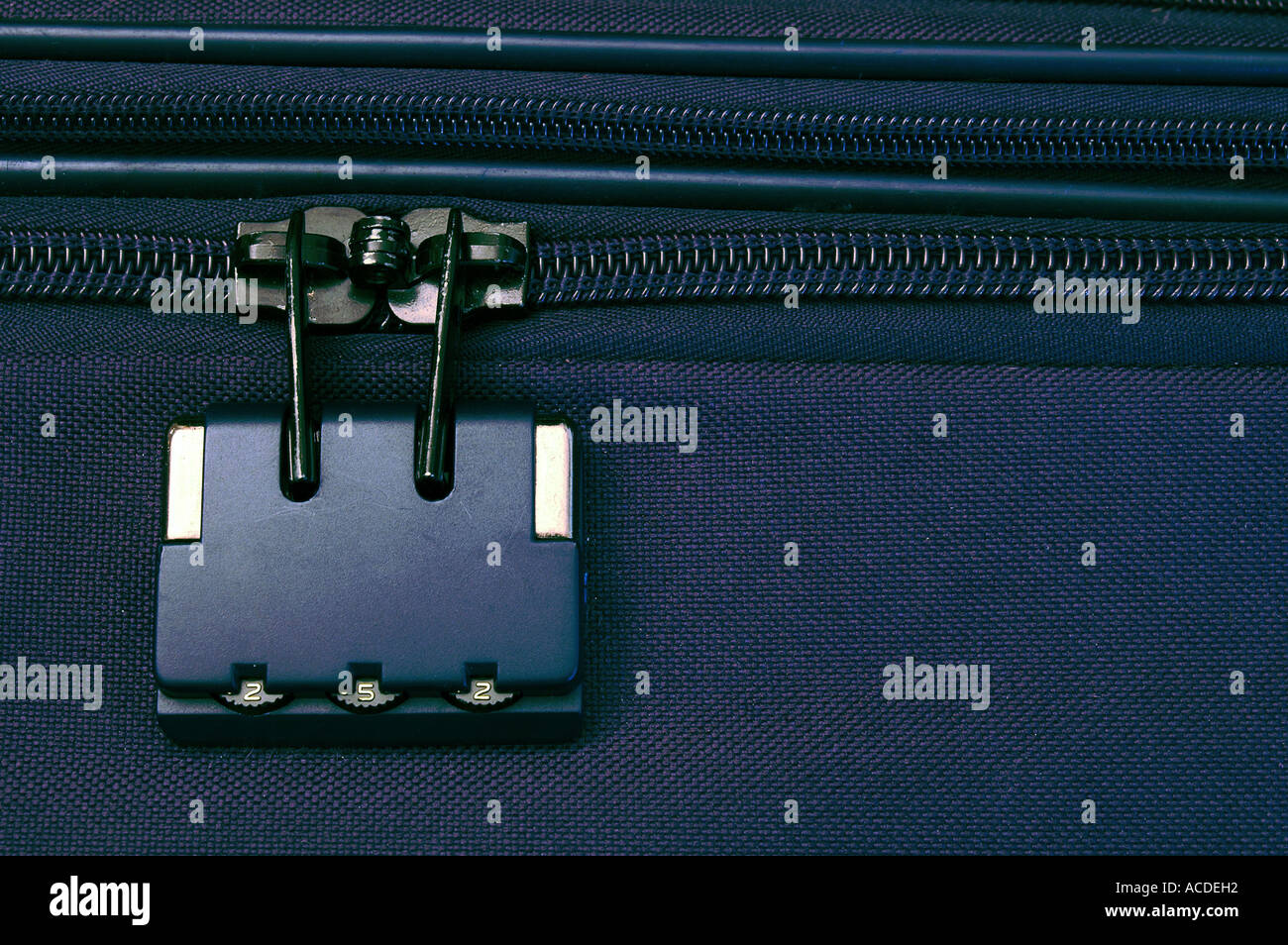 Combination lock for zipper on a suitcase Stock Photo - Alamy