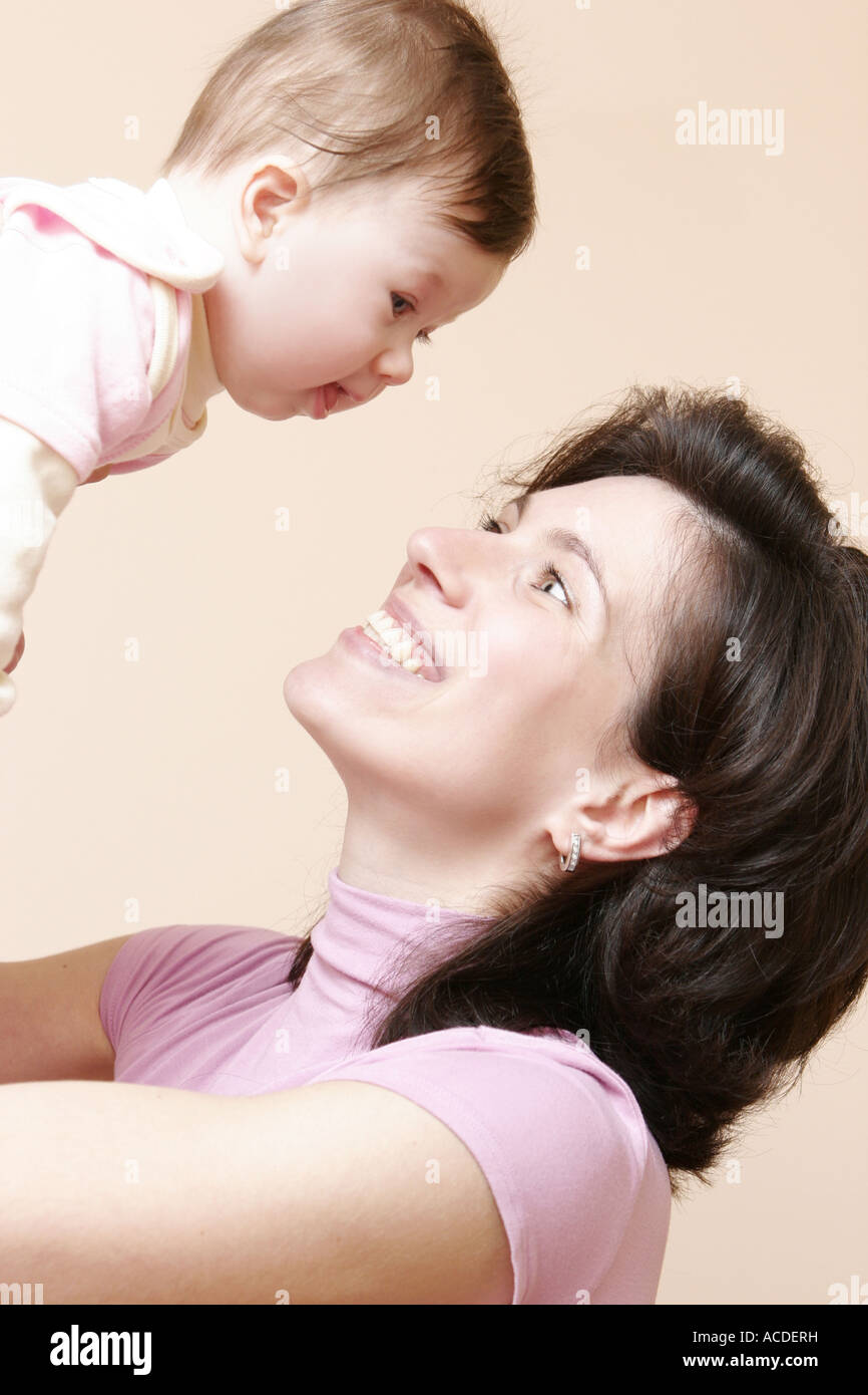 Baby moving arms hires stock photography and images Alamy
