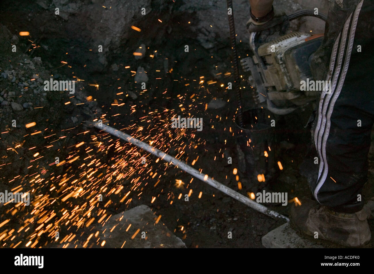 sparks form an angle grinder cutting through steel Stock Photo Alamy