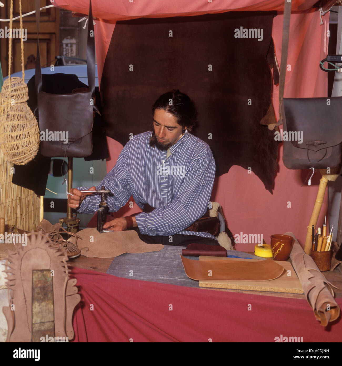 Traditional leather craftsman at Medieval Market / Craft Fair, Palma de Mallorca, Balearic Islands, Spain. 5th March 2007. Stock Photo