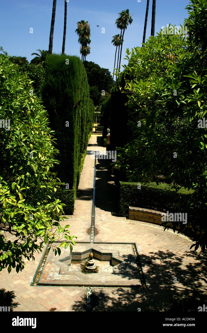Tiled fountain and walkway Alcazar gardens Seville Andalucia Spain Sevilia Andalusia Espana España Stock Photo