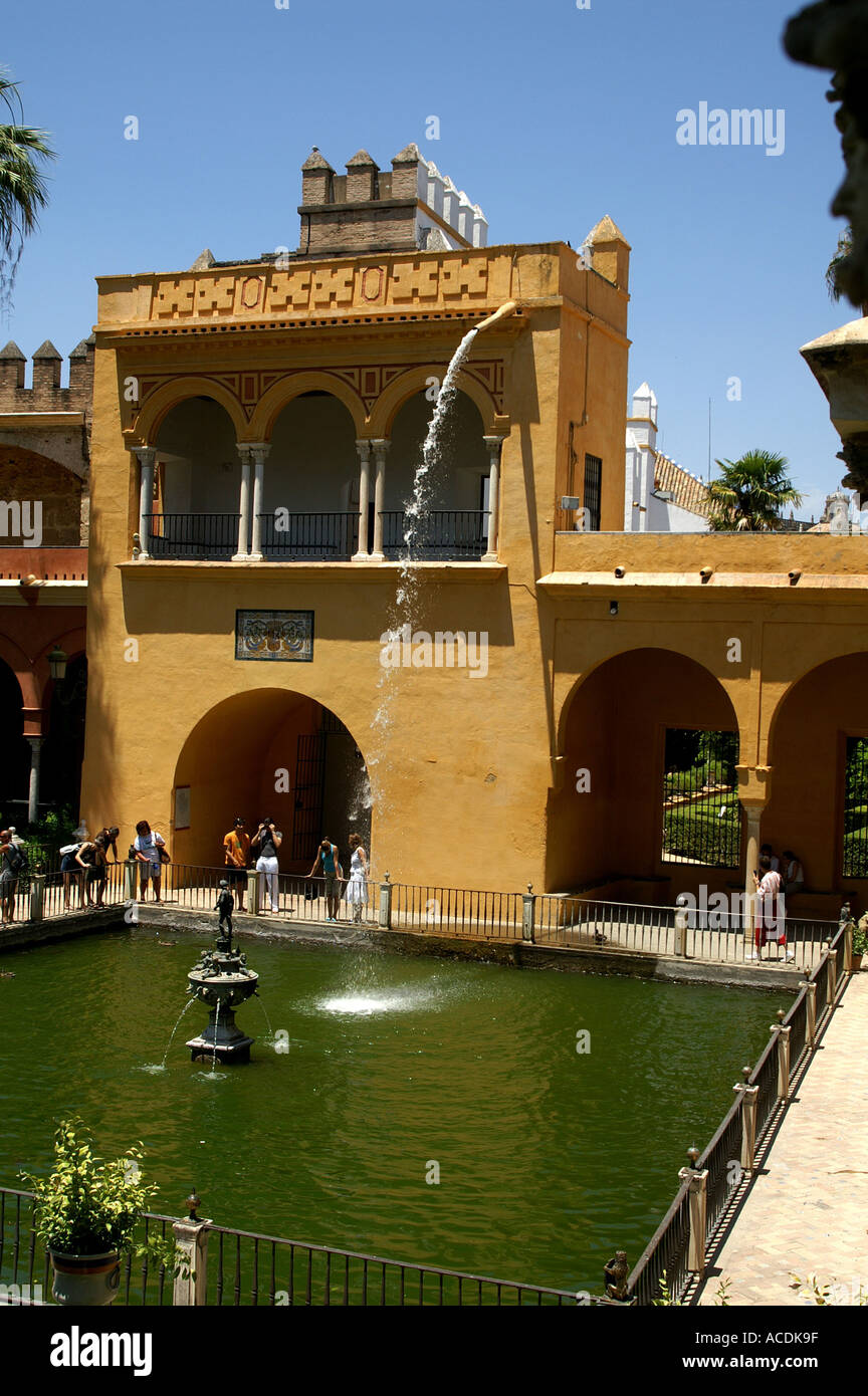 Pool and fountain in Alcazar gardens Seville Andalucia Spain Sevilia Andalusia Espana España Stock Photo