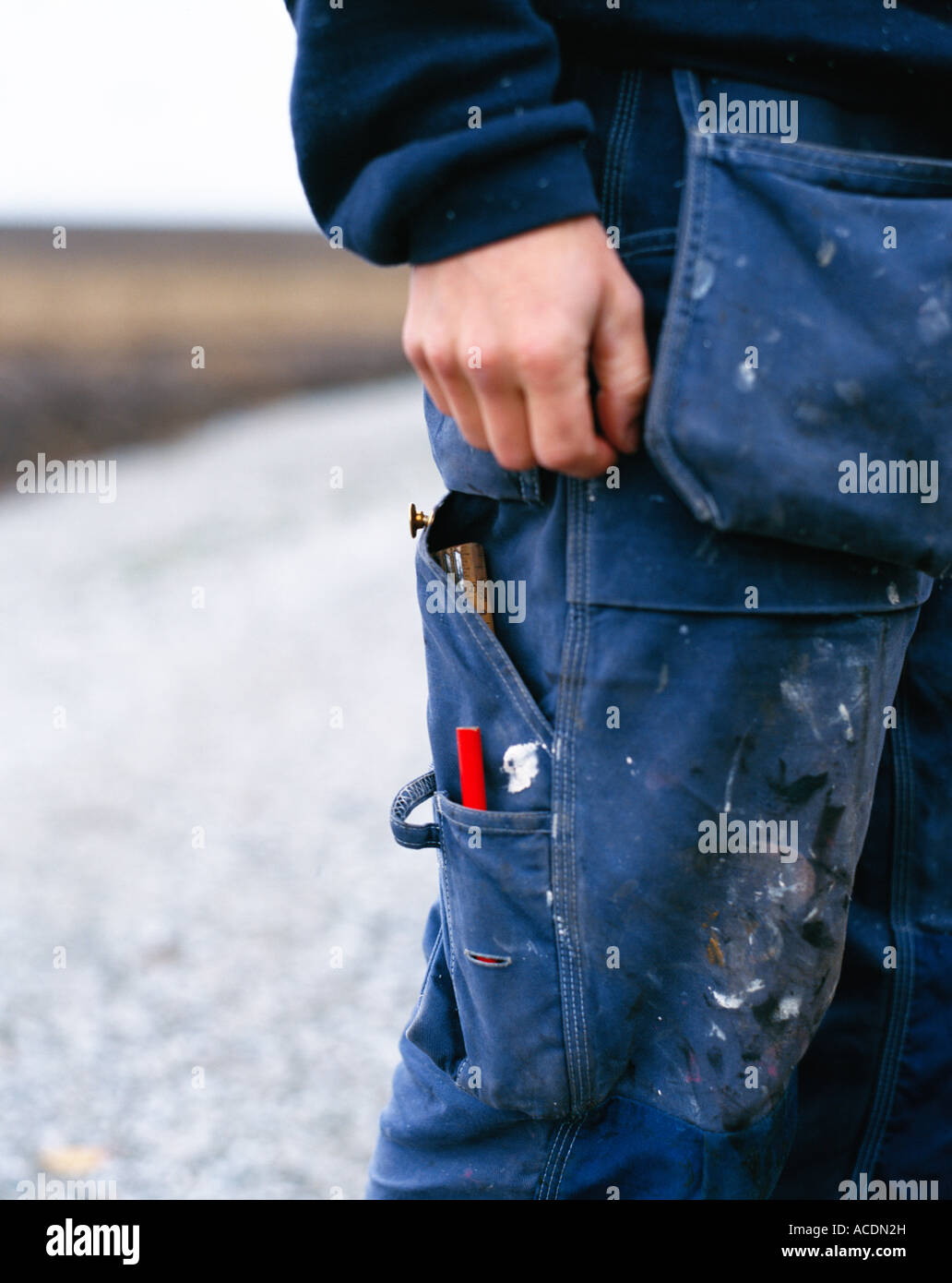 Work-clothes on a carpenter. Stock Photo