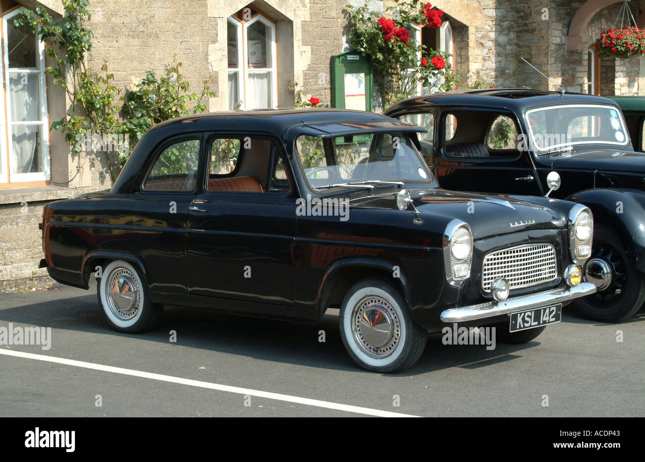 Old Ford Anglia and Morris 8 Parked at Buckfastleigh Station Stock Photo