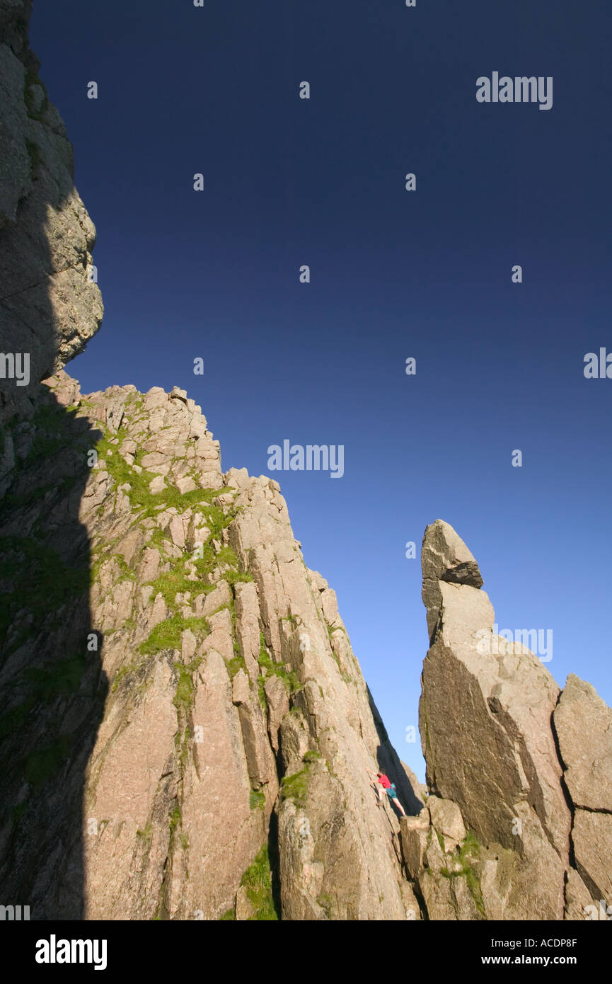 man climbing next to Napes Needle Great Gable Lake District Stock Photo