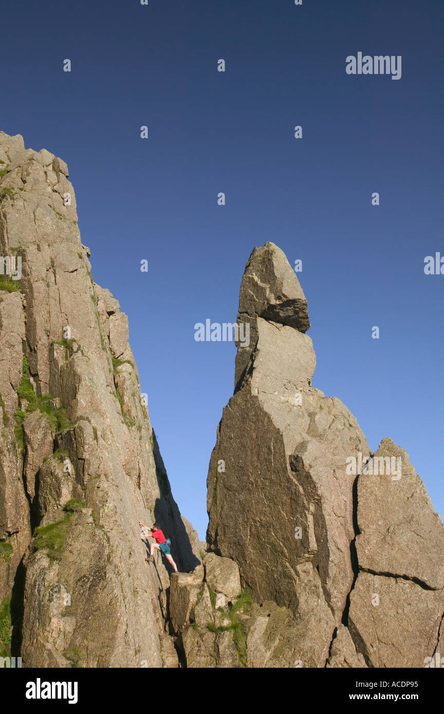 man climbing next to Napes Needle Great Gable Lake District Stock Photo
