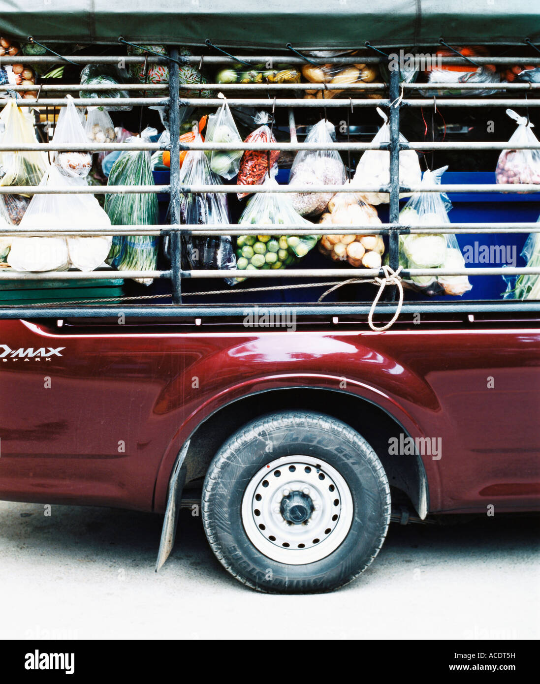 Fruits and vegetables in a car Stock Photo - Alamy