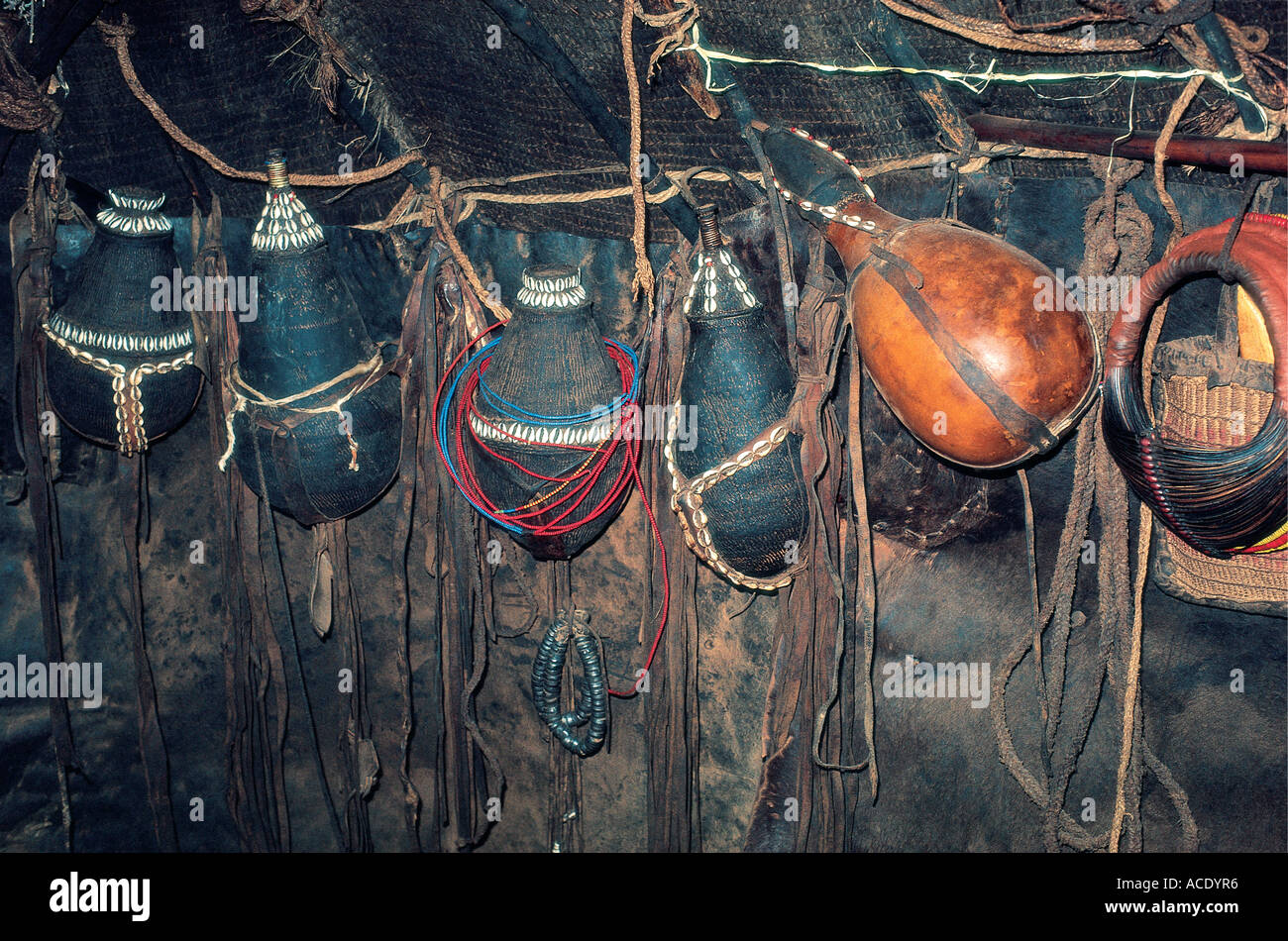 Traditional gourds hanging inside a Rendille hut Korr northern Kenya East Africa Stock Photo