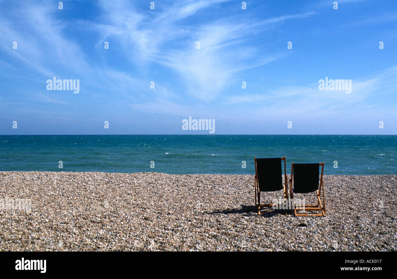 two deck chairs on the beach Stock Photo - Alamy