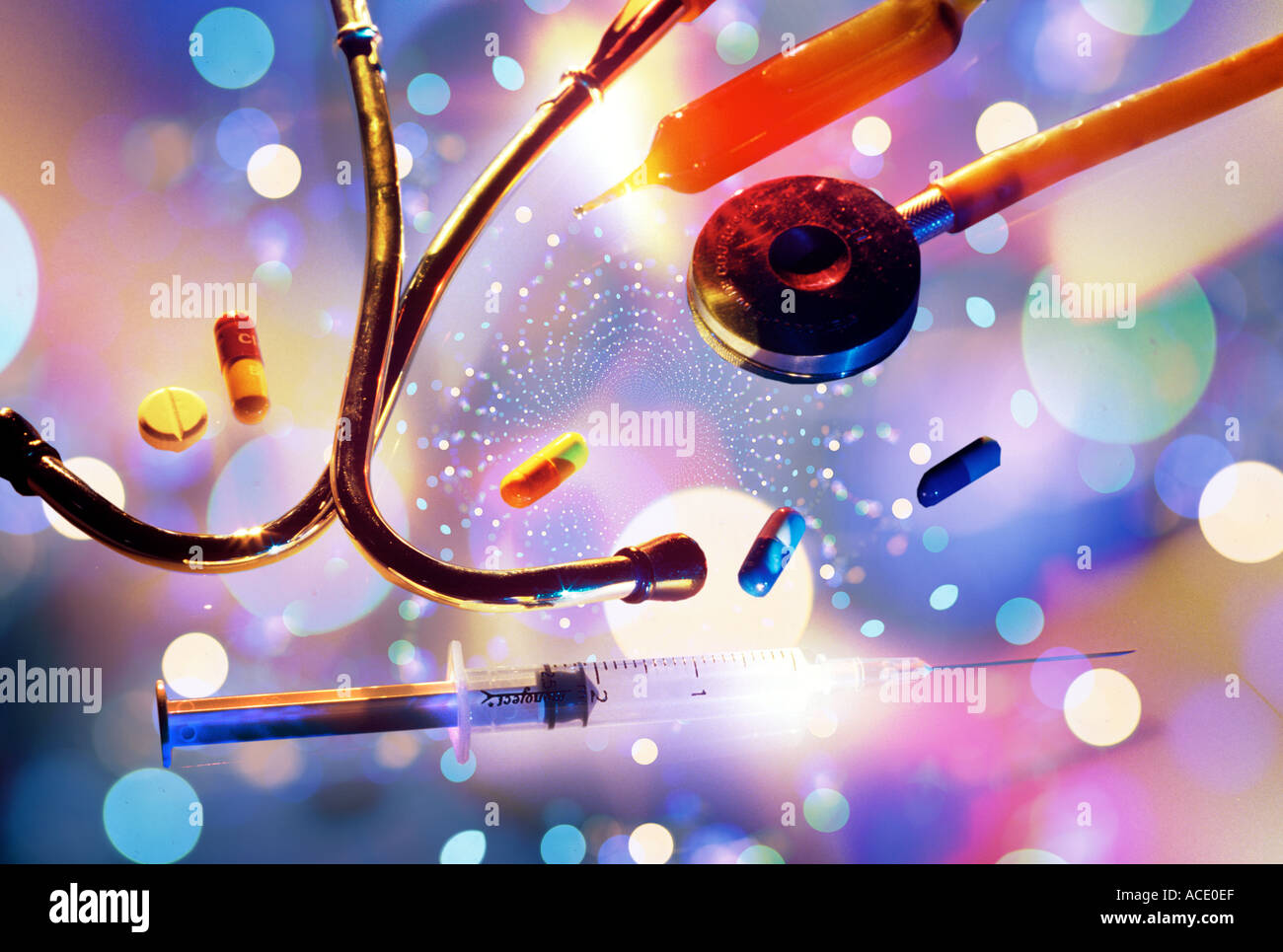 SYRINGE PILLS AND STETHOSCOPE Stock Photo