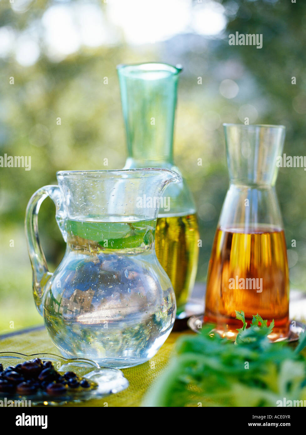 Water and wine in decanters close-up. Stock Photo