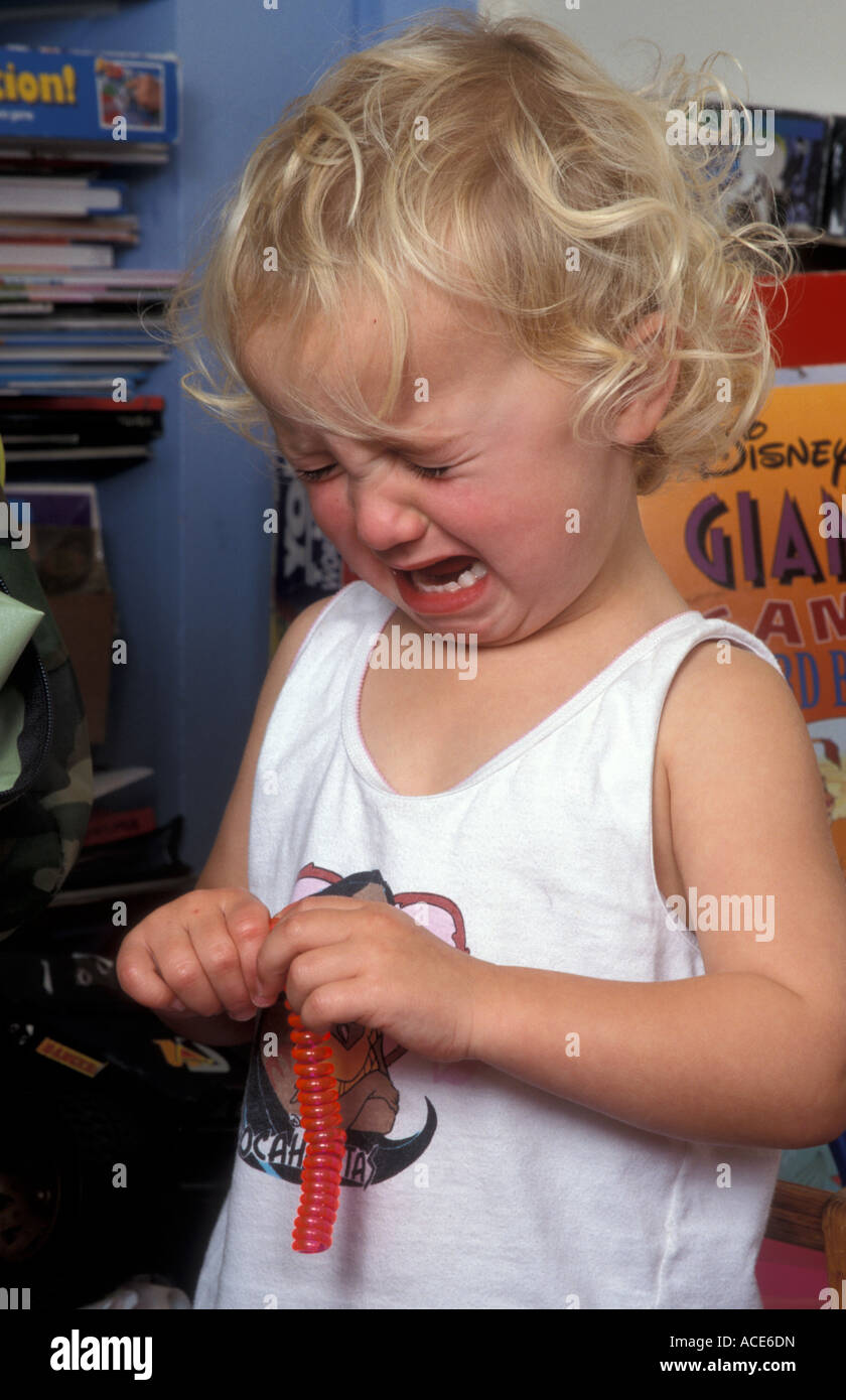 2 year old toddler girl throwing tantrum in her bedroom Stock Photo Alamy