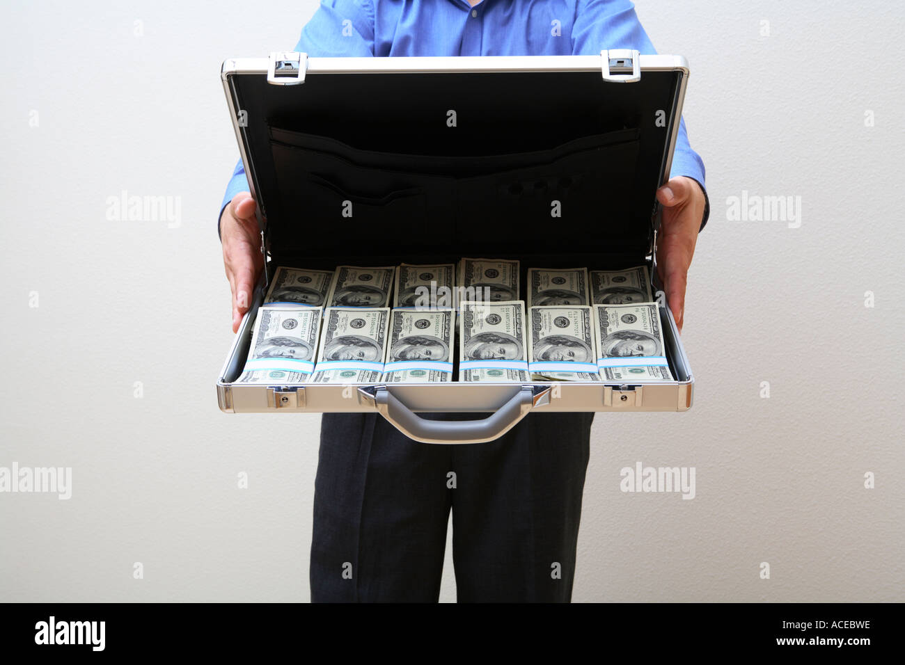 Briefcase full 100 dollar bills hires stock photography and images Alamy