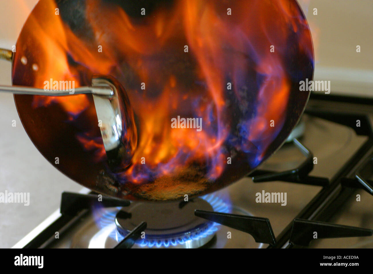 pan on fire Stock Photo Alamy