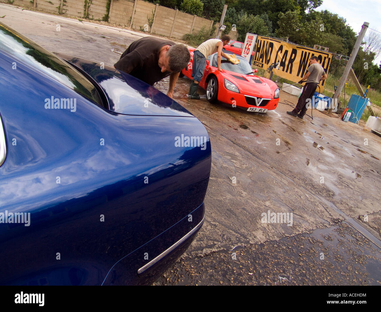Hand Car Wash in a disused petrol station cambridgeshire UK Stock Photo