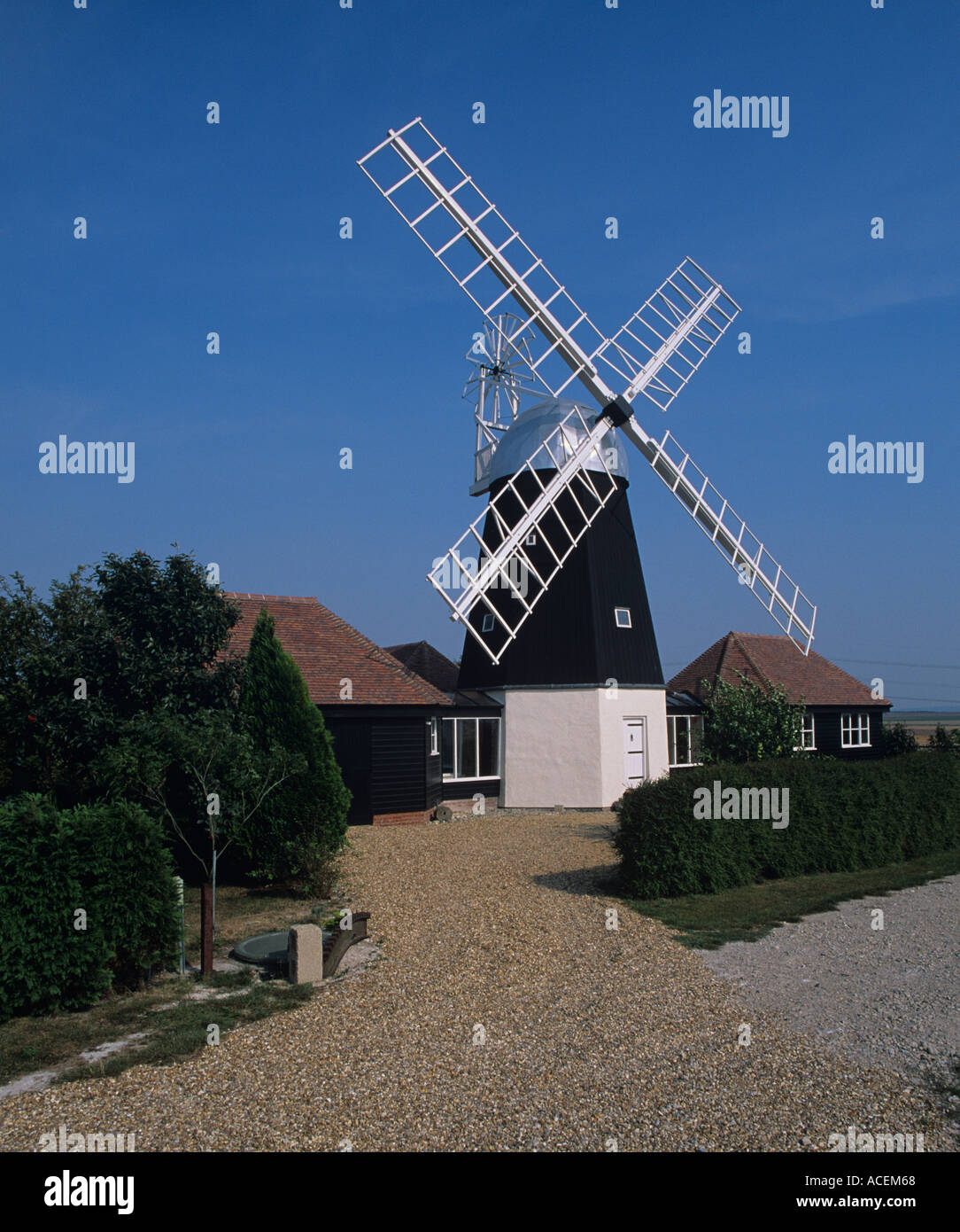 Restored Tower Mill integrated into New House conversion 1993 at Swaffhan Prior Cambridgeshire Stock Photo