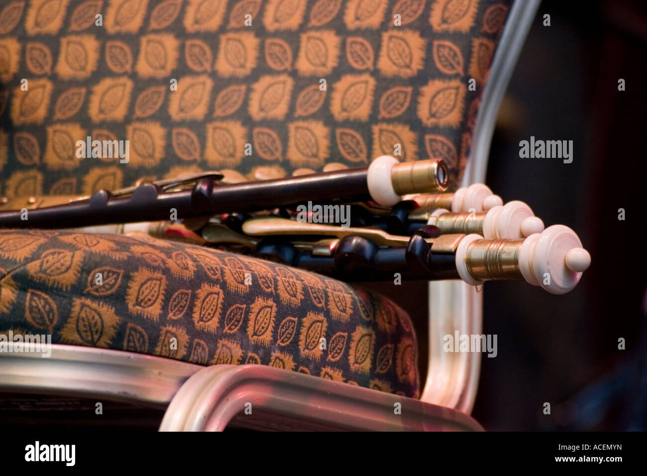 Set of Irish bagpipes, uilleann pipes, resting on the pipers chair. Traditional Irish music festival, county Kerry, Ireland Stock Photo