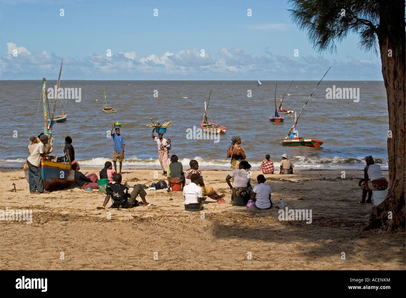 Fishermen with their families on the beach at costa do sol, maputo ... Costa do sol