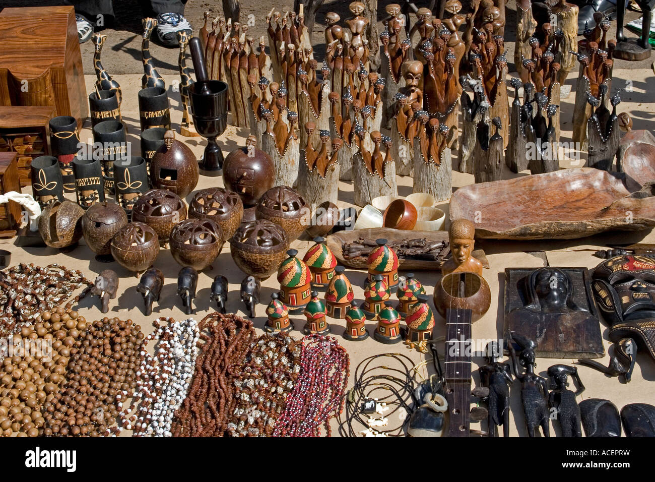Woodcarvings and beadwork for sale in Saturday craft market, Maputo