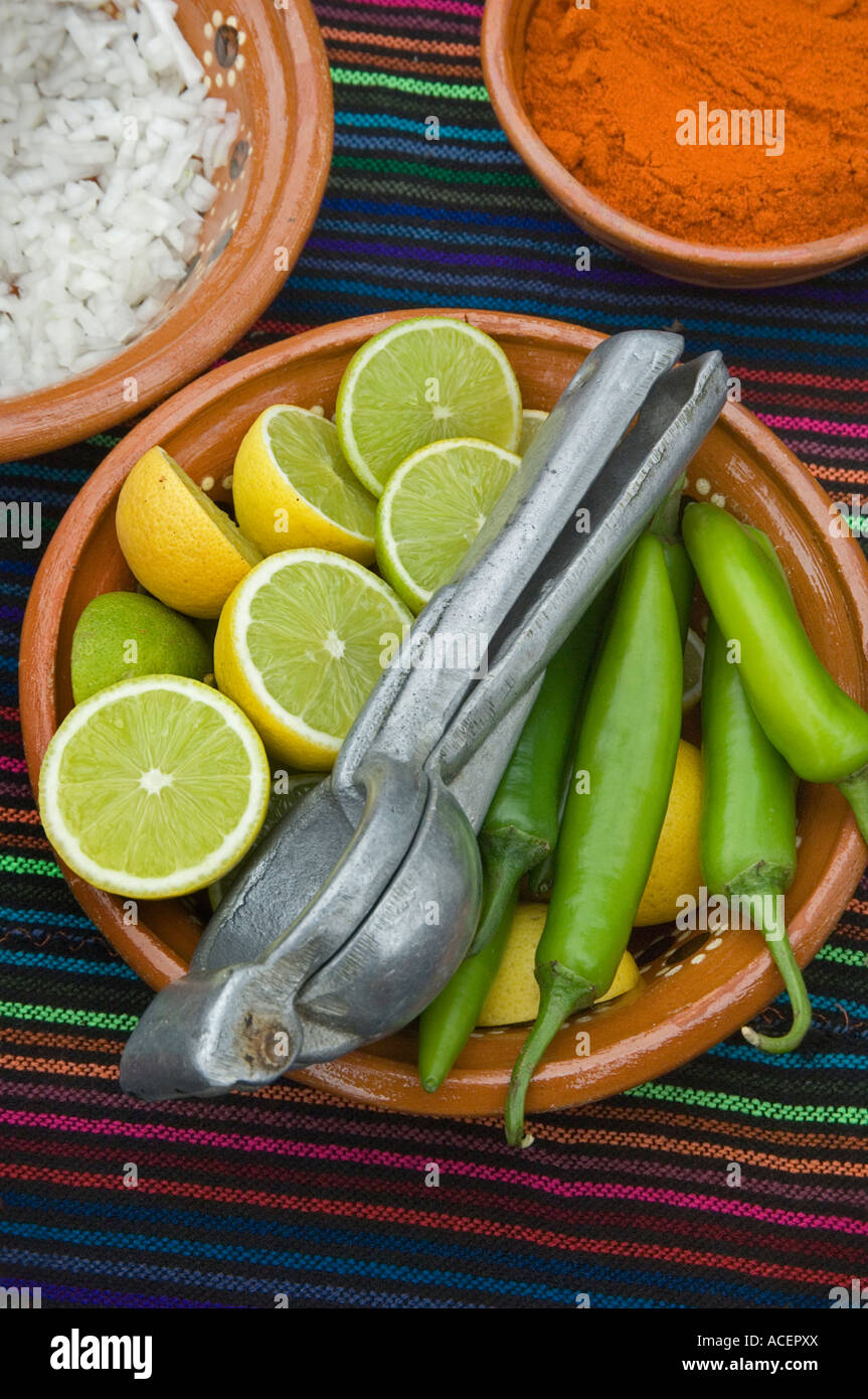 Limes, chiles and spices await diners at a meal in Ensenada, Baja California, Mexico. Stock Photo