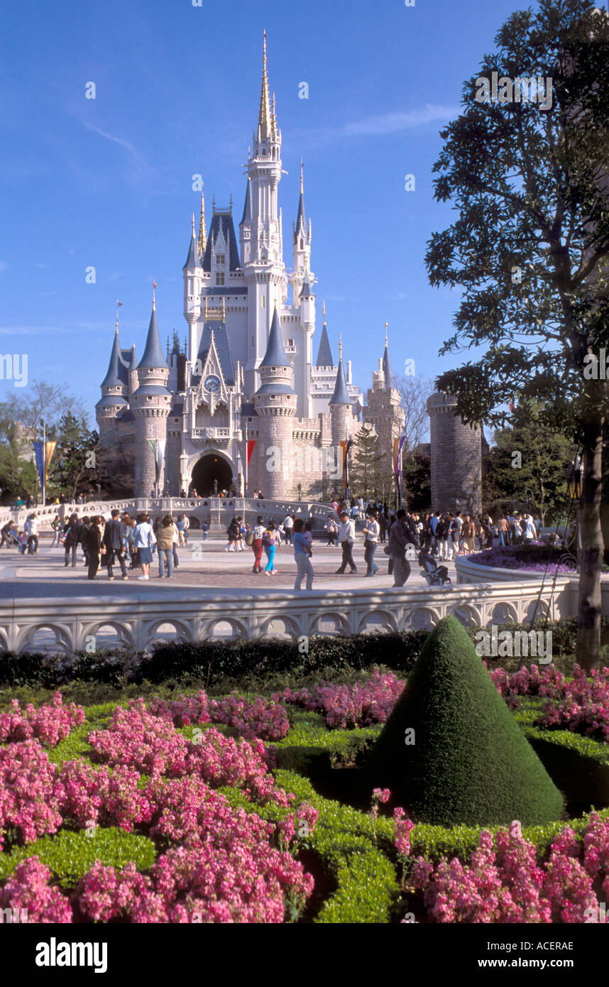 Cinderella castle at Tokyo Disneyland with beautiful spring flowers Stock Photo
